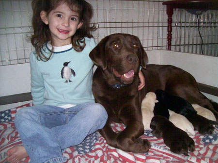 Brett daughter with Roman pups